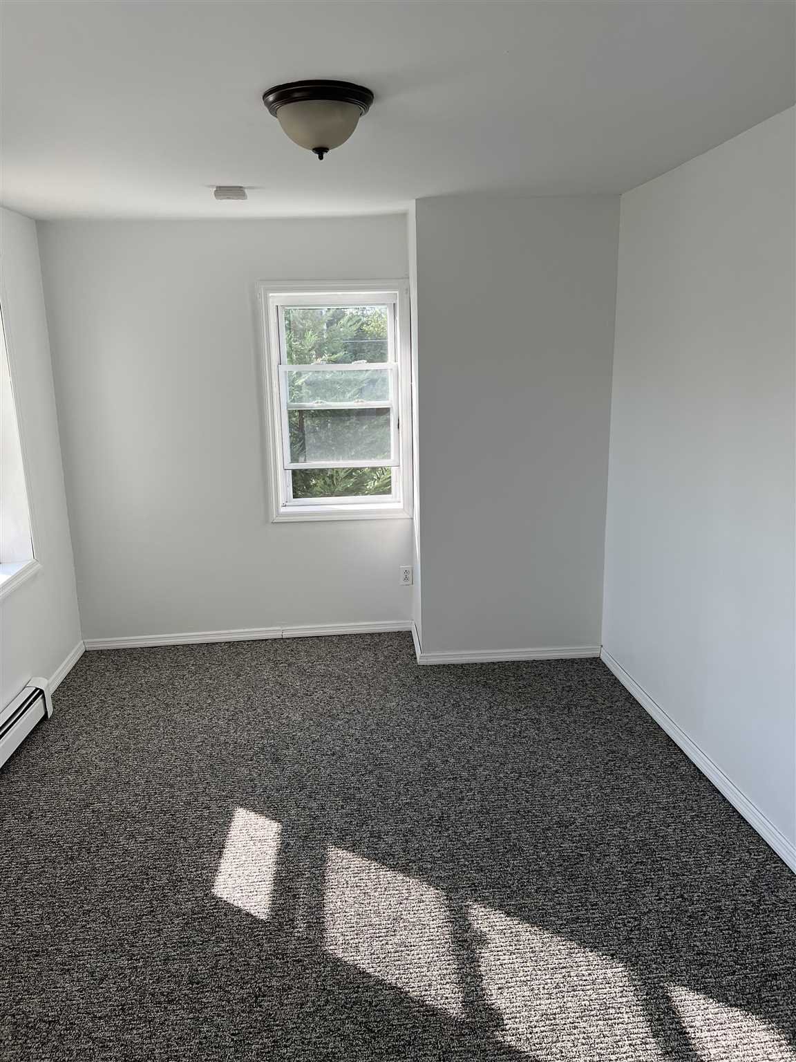 1 Dewindt Street Beacon, NY 12508 - Photo 10 of 12 a view of an empty room with a window