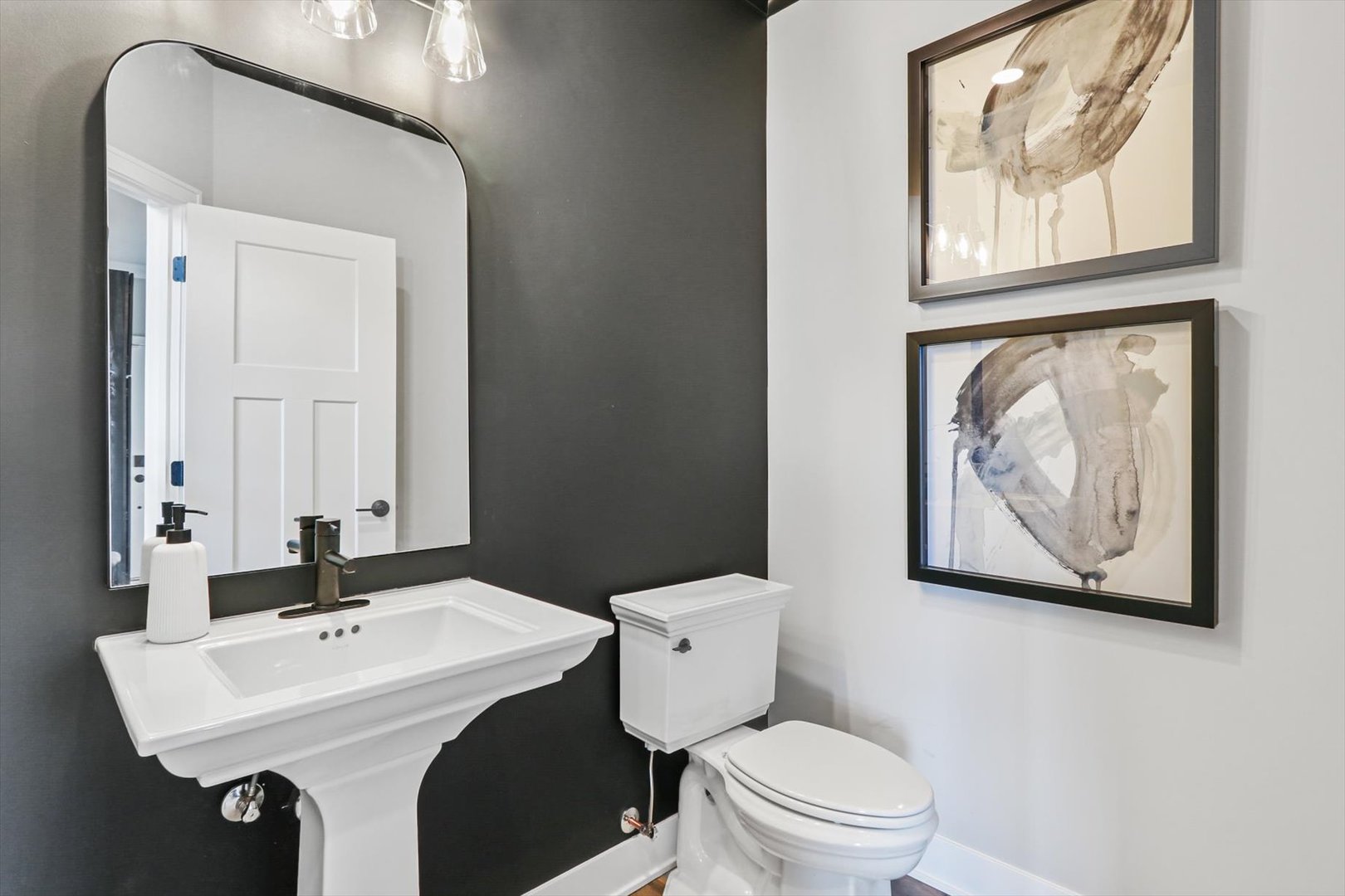 703 Pomfret Court Oswego, IL 60543 - Photo 19 of 34 a bathroom with a sink and a toilet