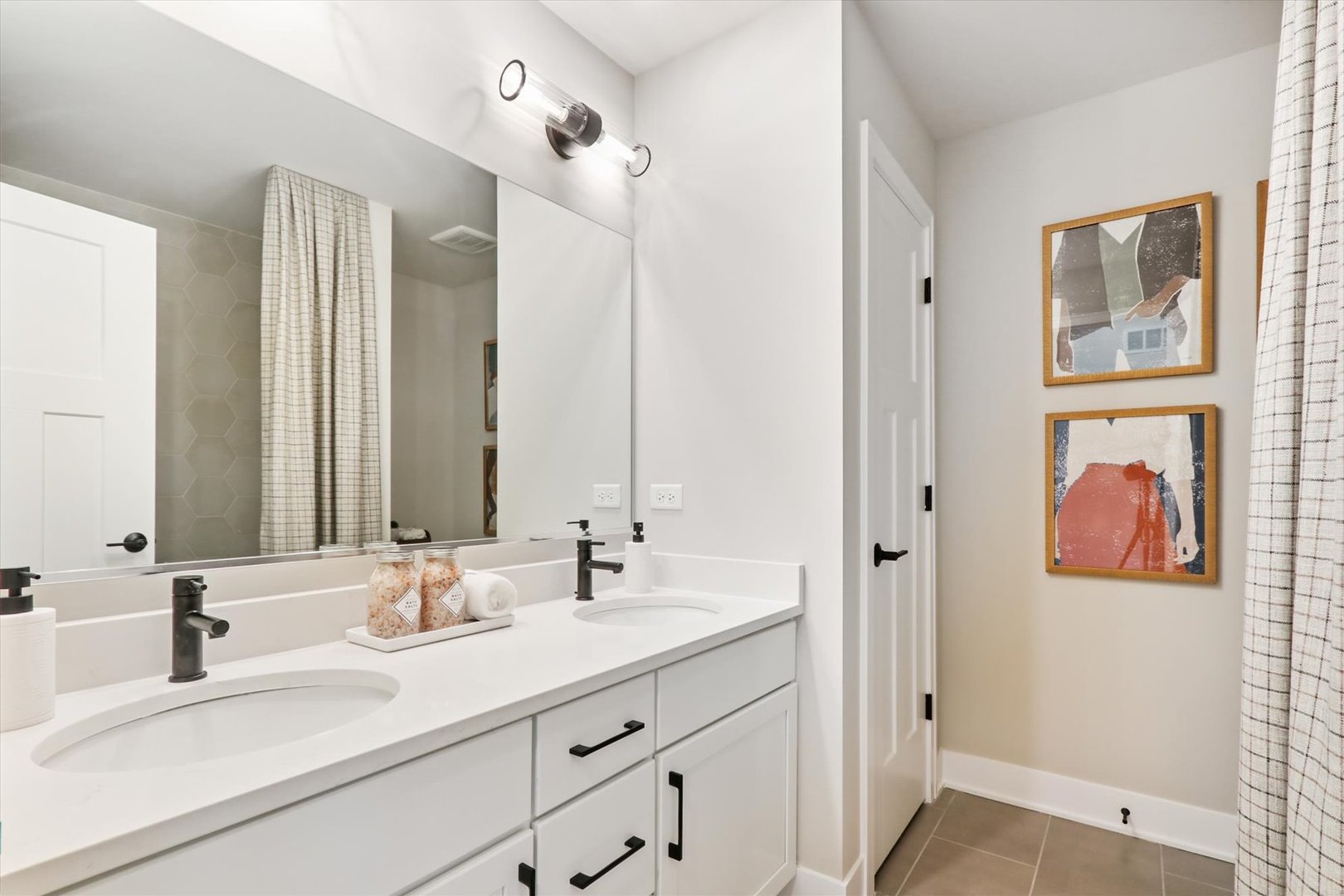 703 Pomfret Court Oswego, IL 60543 - Photo 31 of 34 a bathroom with a double vanity sink mirror and