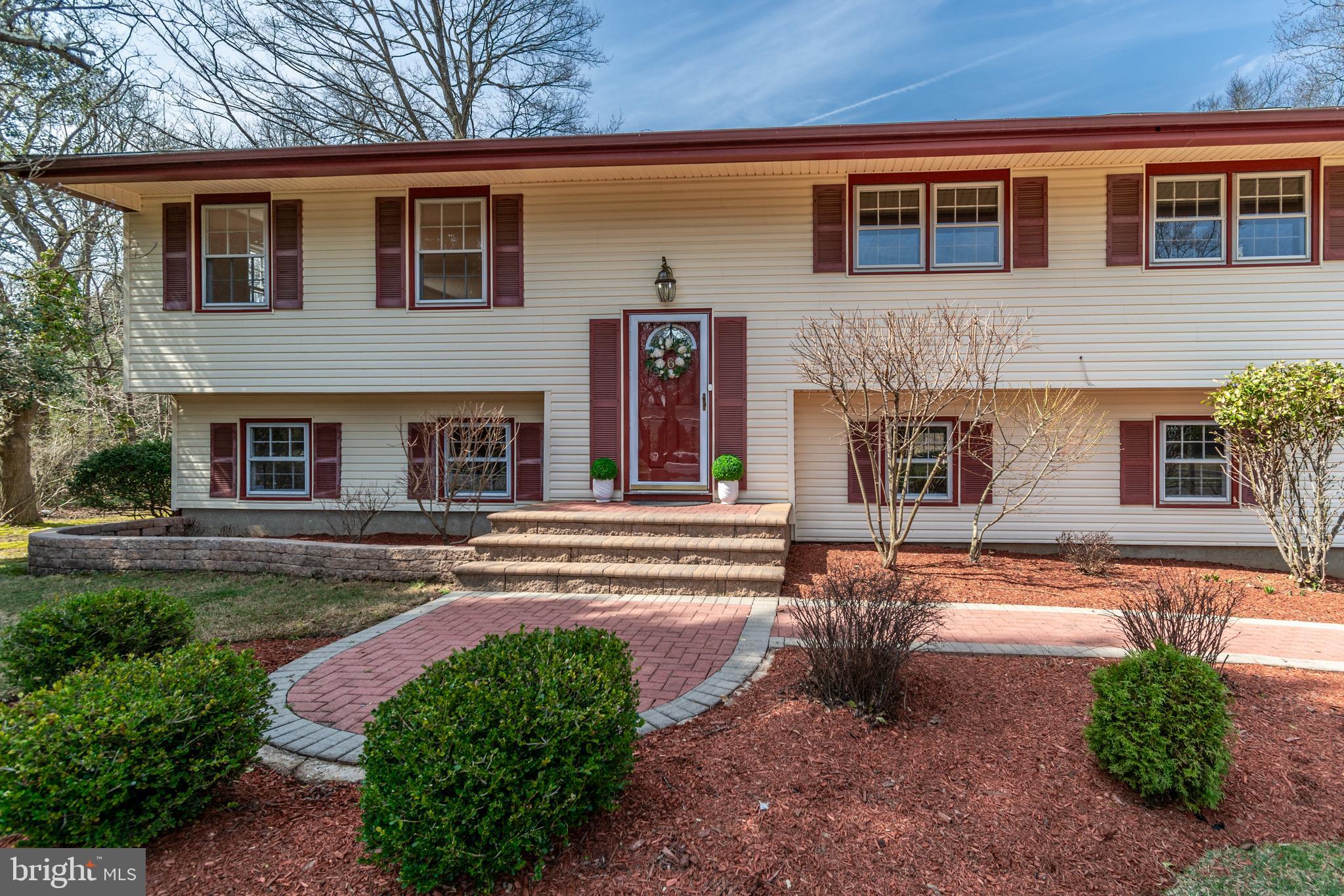 6 Jeffrey Lane Princeton Junction, NJ 08550 - Photo 2 of 66 front view of a house with a yard