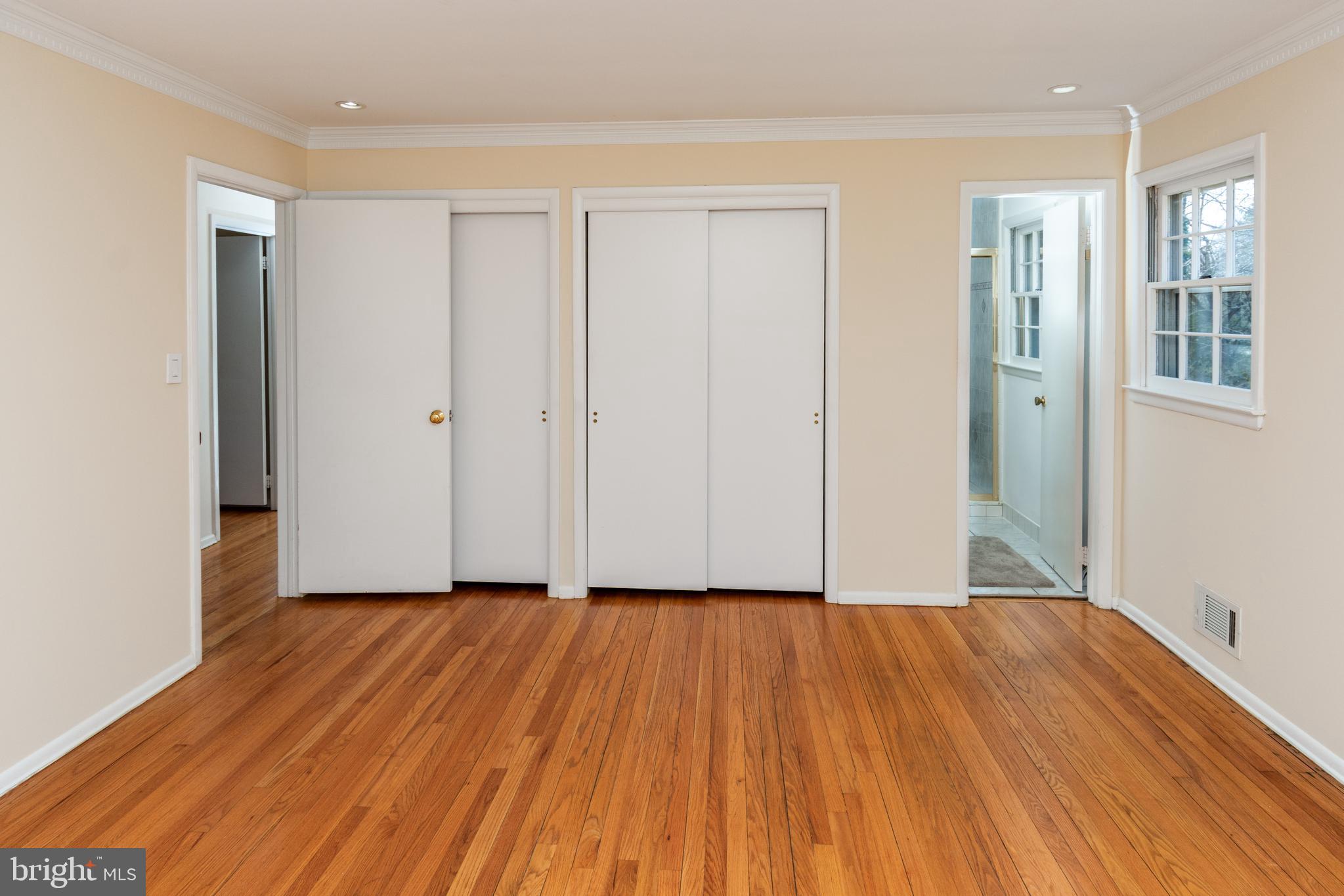 6 Jeffrey Lane Princeton Junction, NJ 08550 - Photo 34 of 66 a view of an empty room with wooden floor and a window
