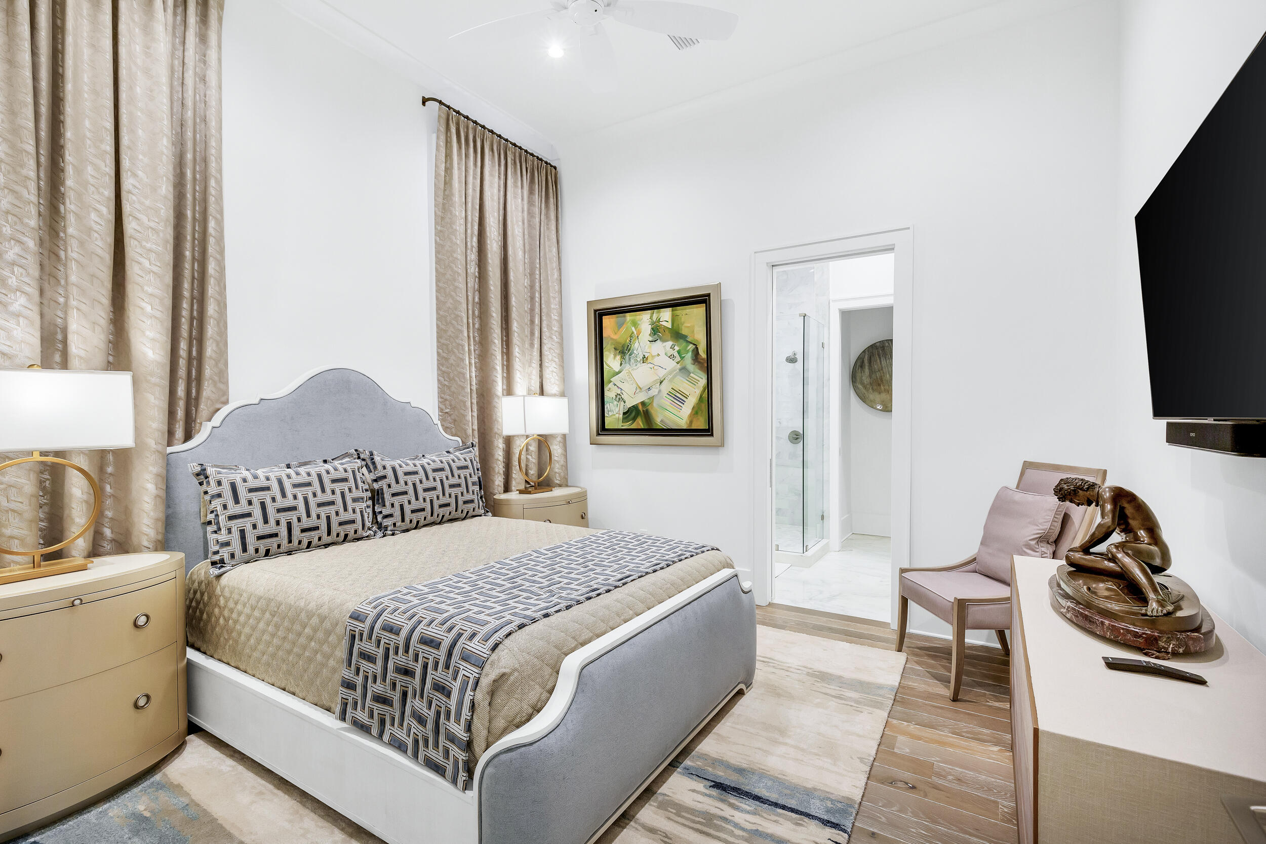 24 Bennett Santa Rosa Beach, FL 32459 - Photo 48 of 74 a bedroom with a bed and a flat tv screen on the dresser