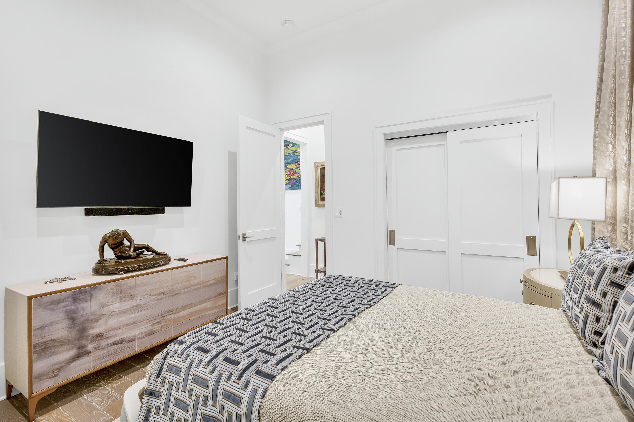 24 Bennett Santa Rosa Beach, FL 32459 - Photo 49 of 74 a bedroom with a bed and a flat screen tv