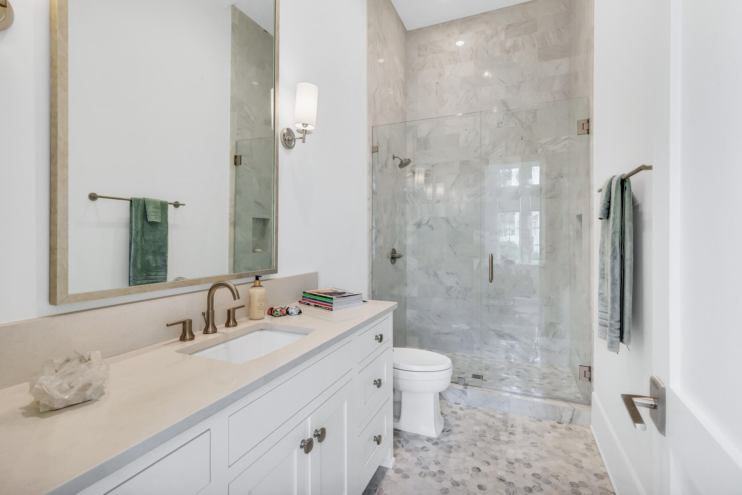24 Bennett Santa Rosa Beach, FL 32459 - Photo 52 of 74 a bathroom with a double vanity sink toilet mirror and shower