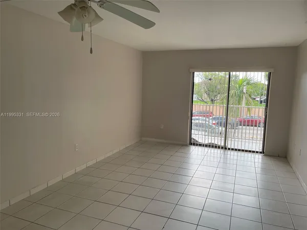 a view of a room with a large window