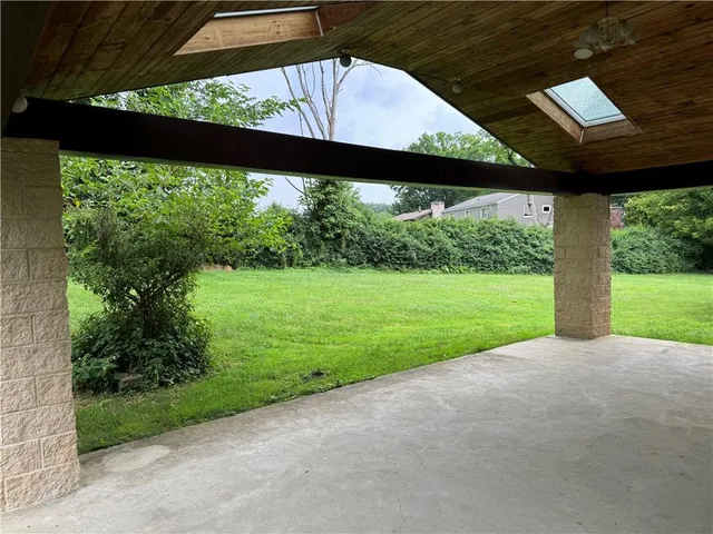 a view of backyard with green space