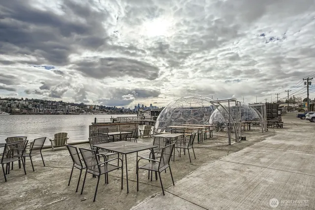 a view of a ocean with nearby beach