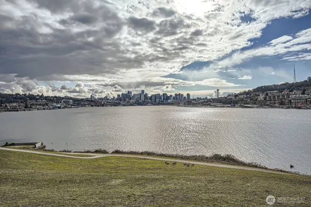 a view of a city with lawn chairs