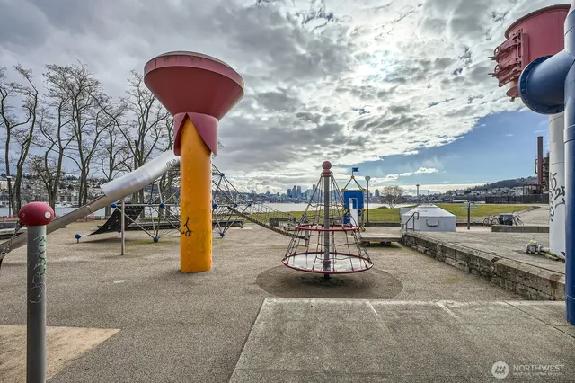 a view of empty space with large trees