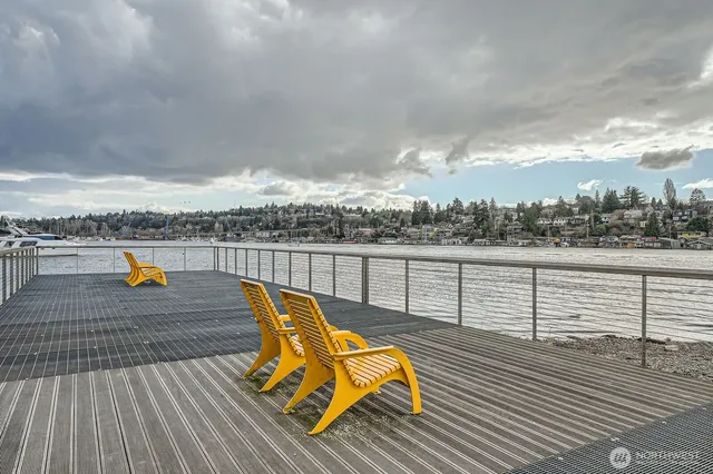 an aerial view of a building with lake view