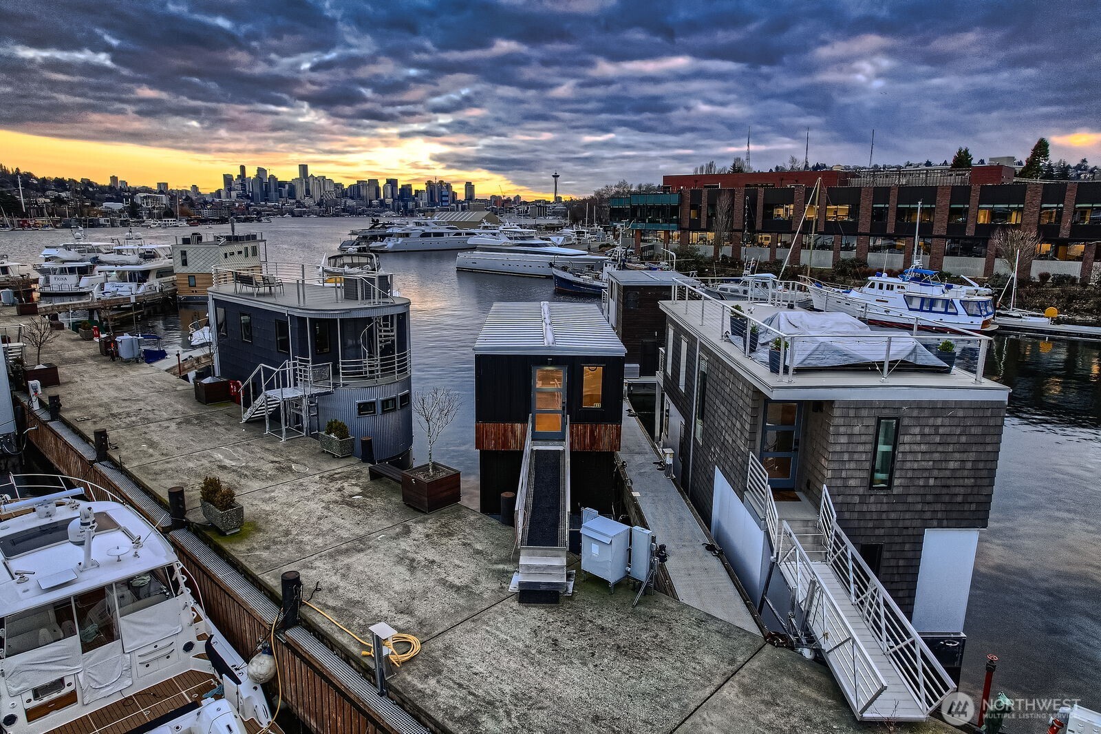2309 North Northlake Way, Unit 5 Seattle, WA 98103 - Photo 7 of 39 a view of a water with many windows