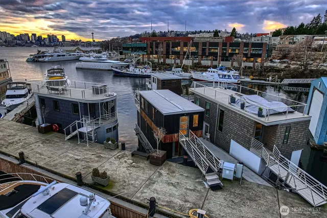 a view of a chairs and table in a backyard