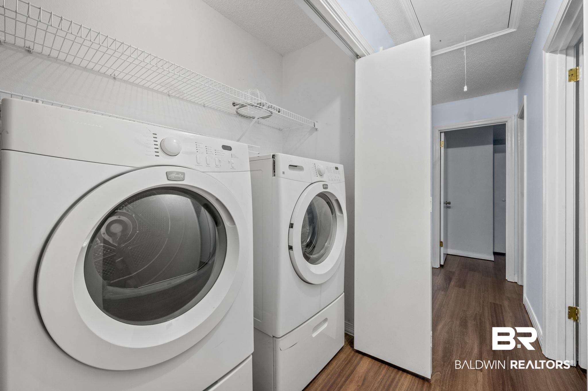3716 Pepper Ridge Drive Mobile, AL 36693 - Photo 16 of 20 Clothes washing area with dark wood-type flooring, a textured ceiling, and separate washer and dryer
