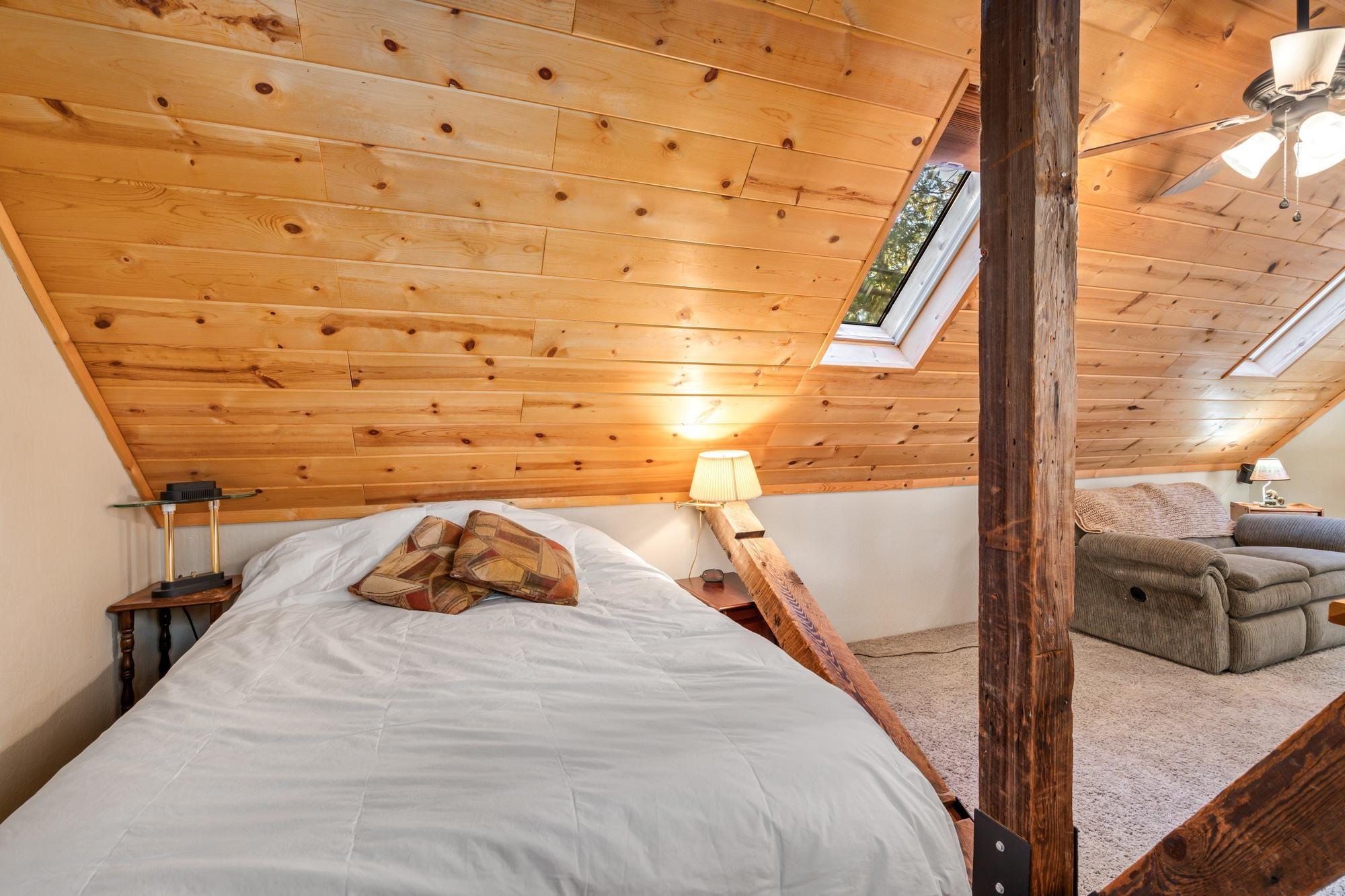 25482 Rebekah Road Long Barn, CA 95335 - Photo 15 of 42 a bed sitting in a bedroom next to a window