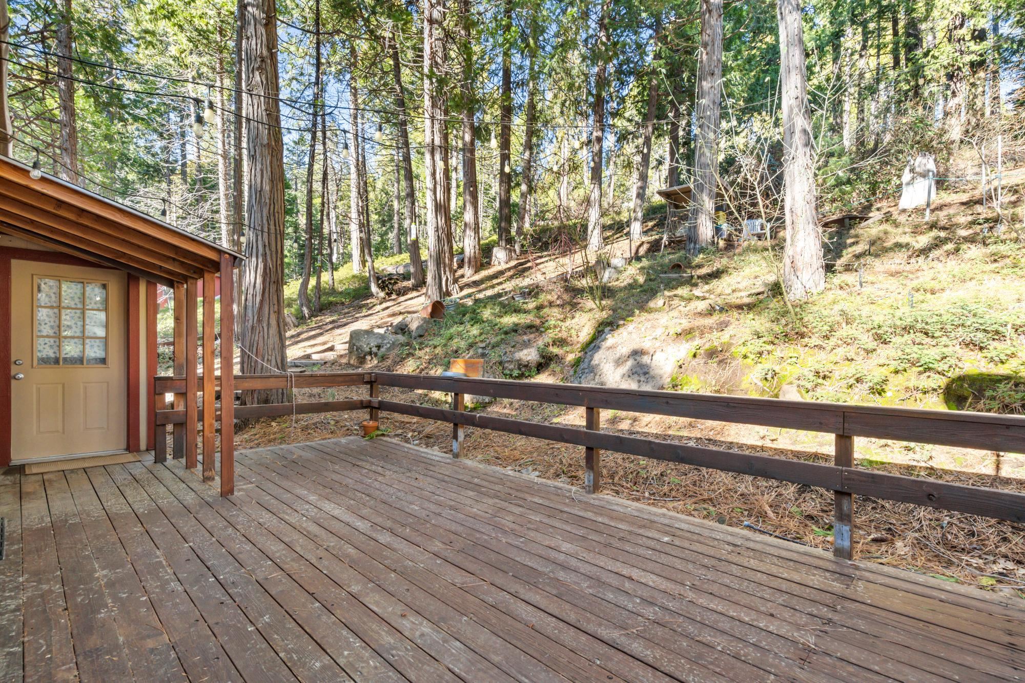 25482 Rebekah Road Long Barn, CA 95335 - Photo 22 of 42 a bench is sitting in the middle of a house