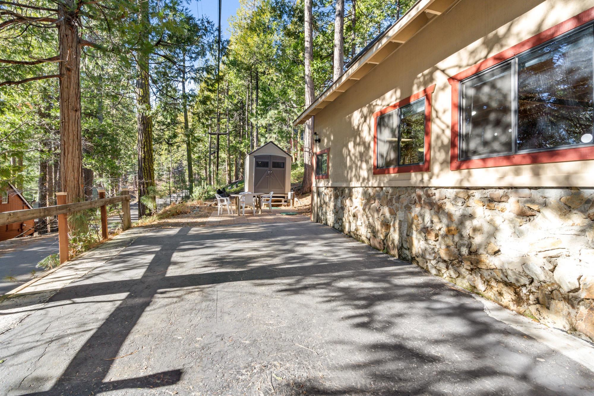 25482 Rebekah Road Long Barn, CA 95335 - Photo 26 of 42 a view of road with large trees