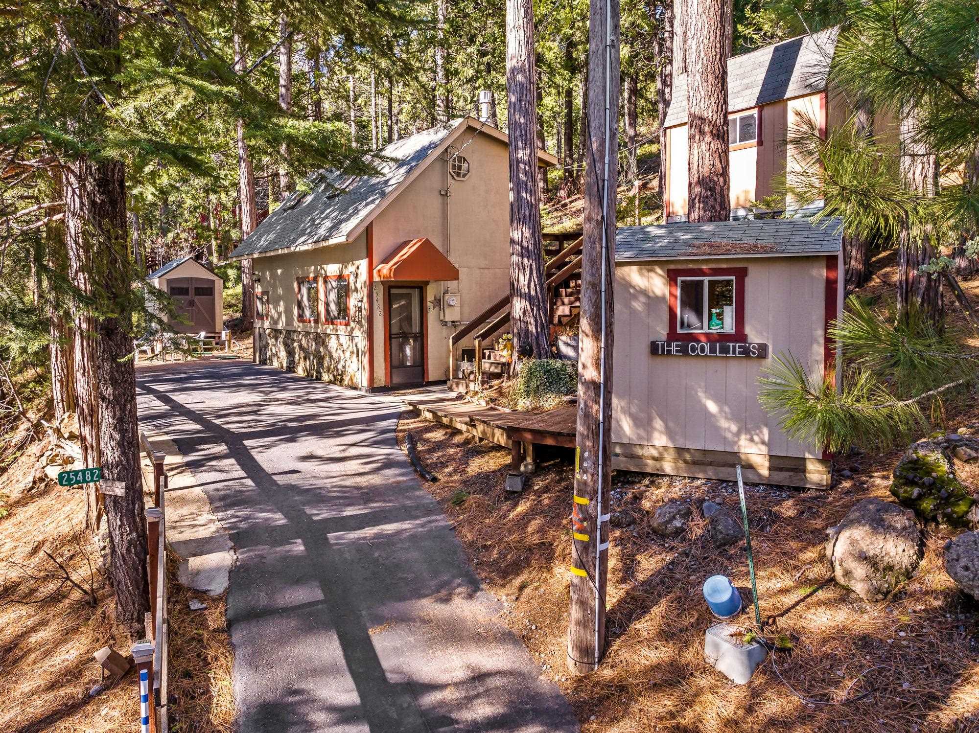 25482 Rebekah Road Long Barn, CA 95335 - Photo 34 of 42 a view of multiple houses with yard
