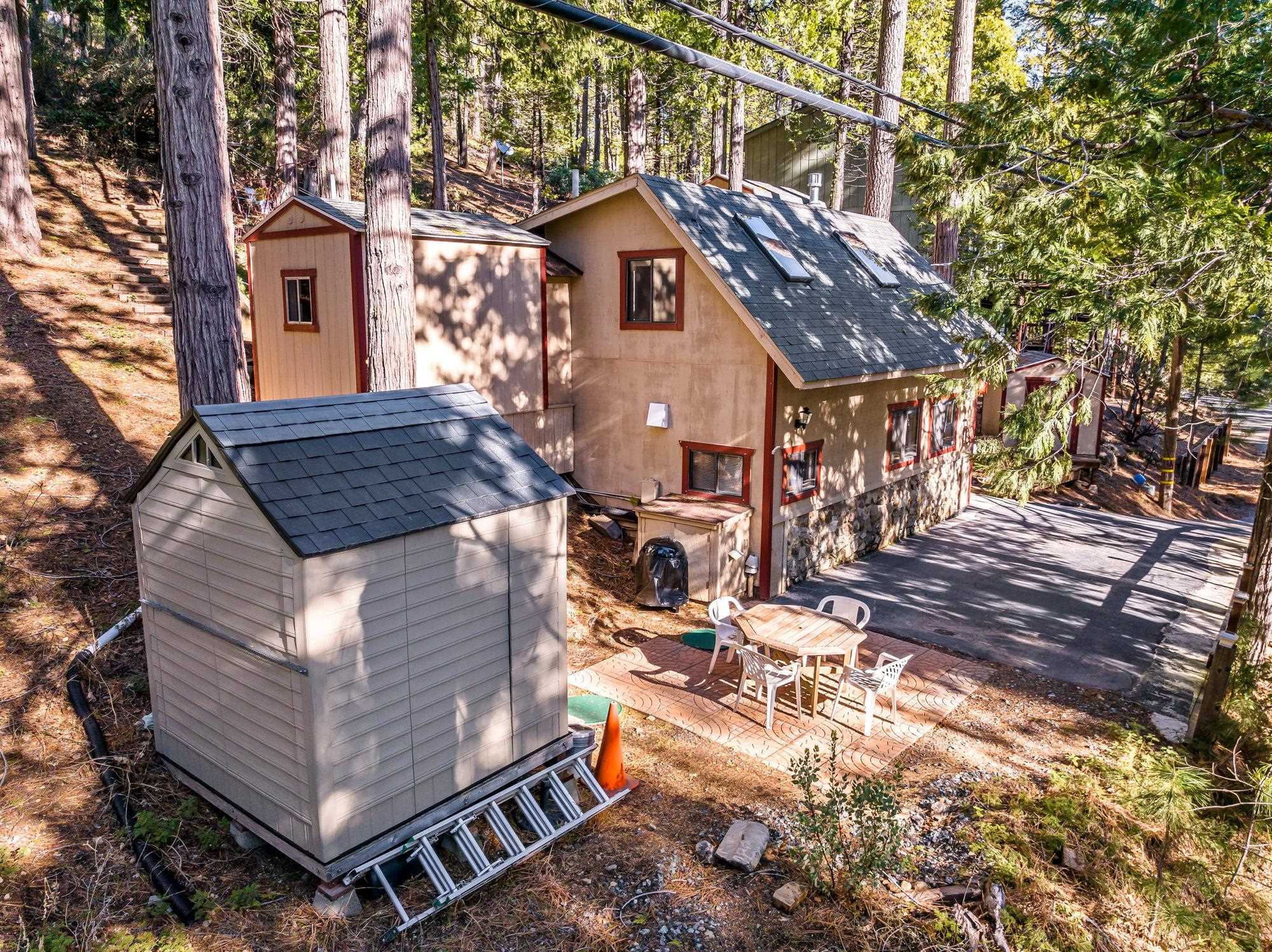 25482 Rebekah Road Long Barn, CA 95335 - Photo 35 of 42 a view of a house with a yard