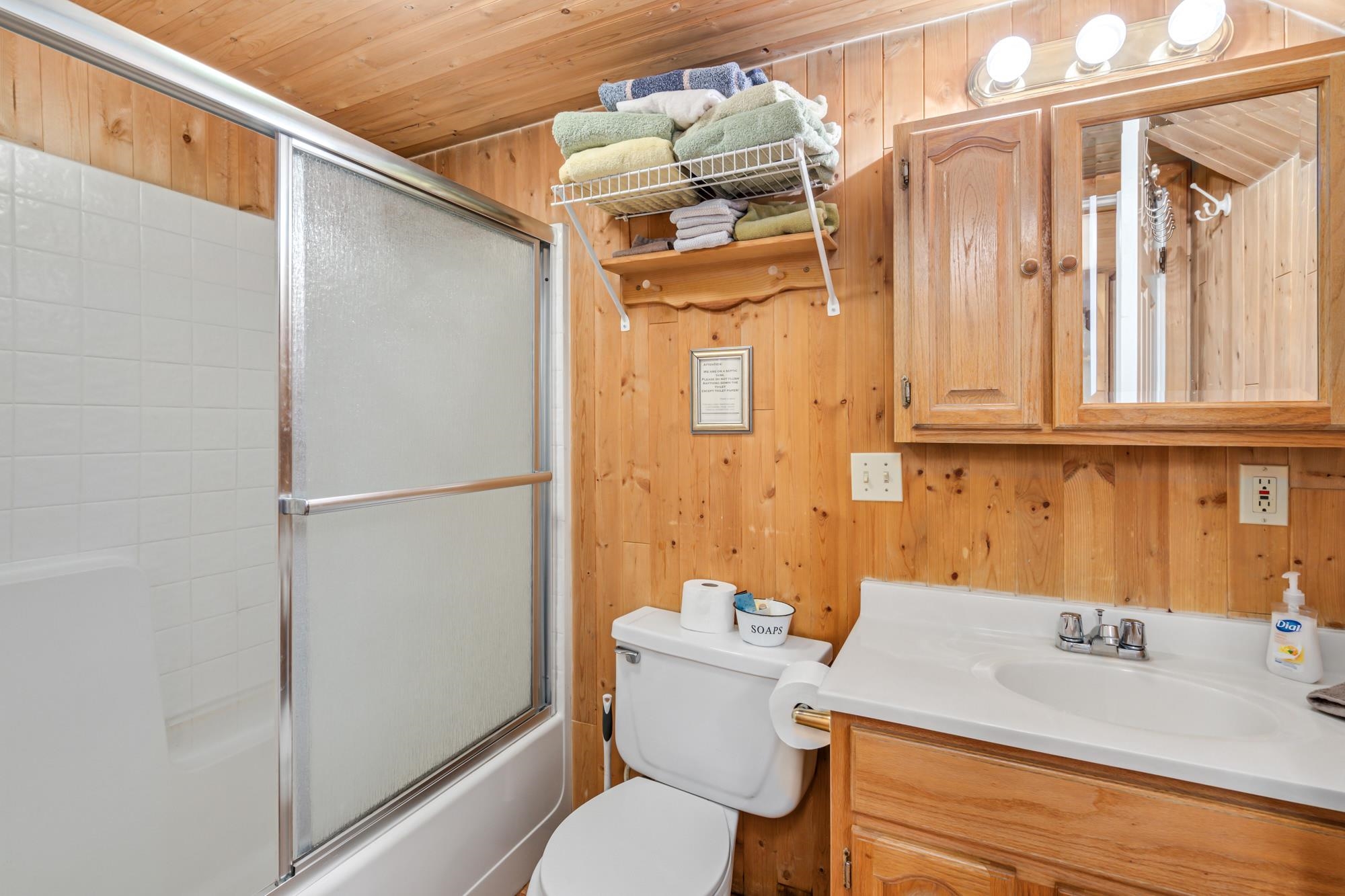 25482 Rebekah Road Long Barn, CA 95335 - Photo 7 of 42 a bathroom with a granite countertop sink toilet and shower
