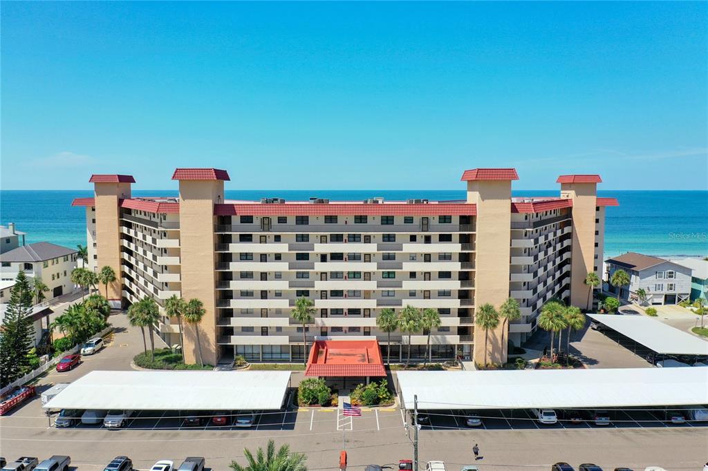 18304 Gulf Boulevard, Unit 116 Redington Shores, FL 33708 - Photo 1 of 51 a view of building and outdoor space
