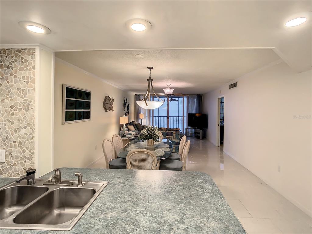 18304 Gulf Boulevard, Unit 116 Redington Shores, FL 33708 - Photo 16 of 51 a view of a living room and dining room