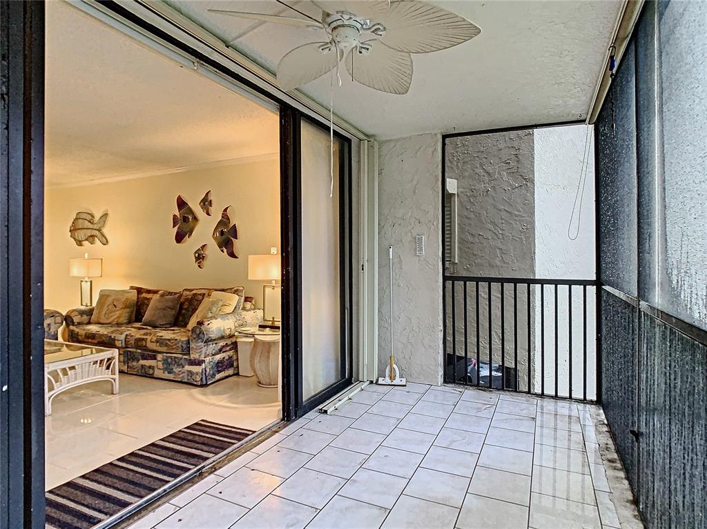 18304 Gulf Boulevard, Unit 116 Redington Shores, FL 33708 - Photo 38 of 51 a very nice looking room with a glass door