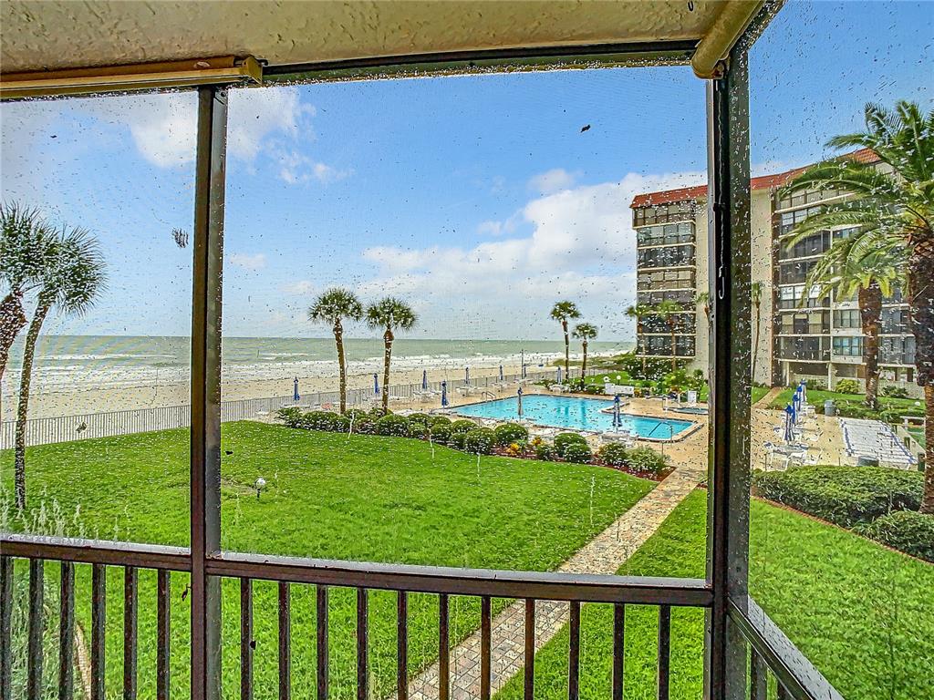 18304 Gulf Boulevard, Unit 116 Redington Shores, FL 33708 - Photo 42 of 51 a view of swimming pool from balcony