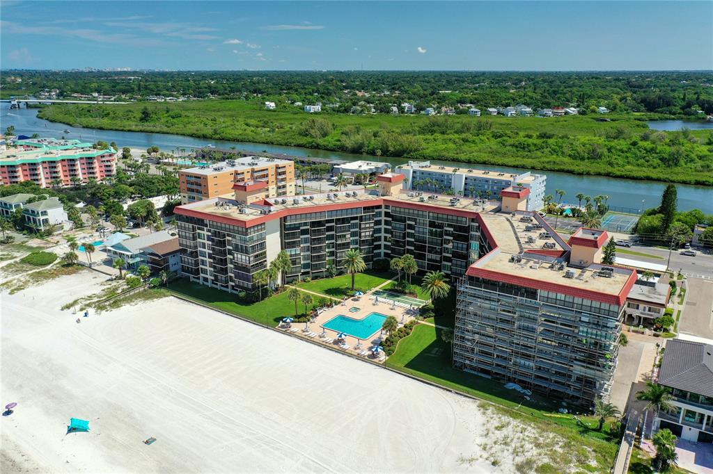 18304 Gulf Boulevard, Unit 116 Redington Shores, FL 33708 - Photo 46 of 51 a view of a chairs and table in the terrace