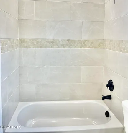 a bathroom with a bathtub