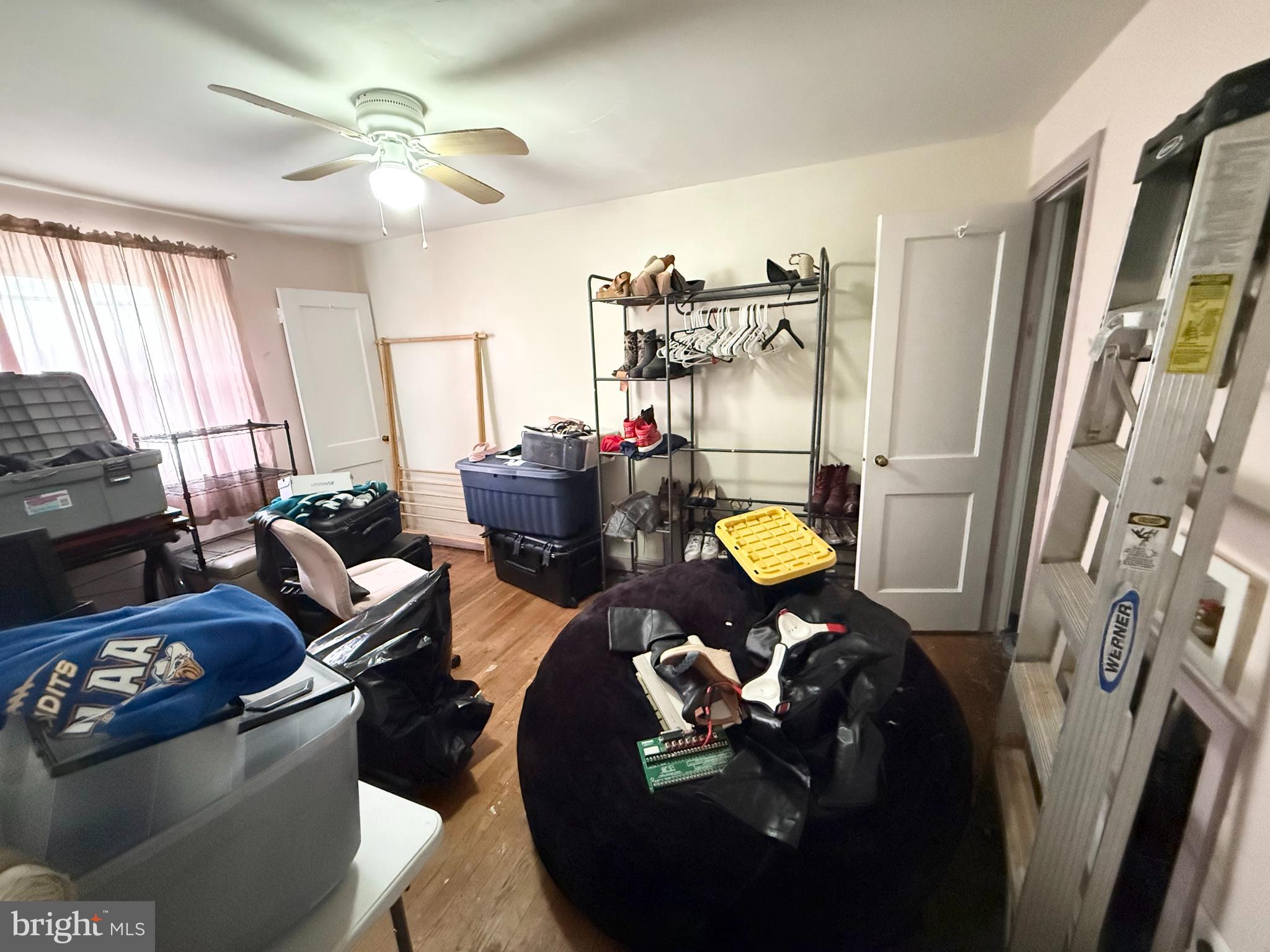 409 North Springfield Road Clifton Heights, PA 19018 - Photo 8 of 10 a living room with furniture and a chandelier