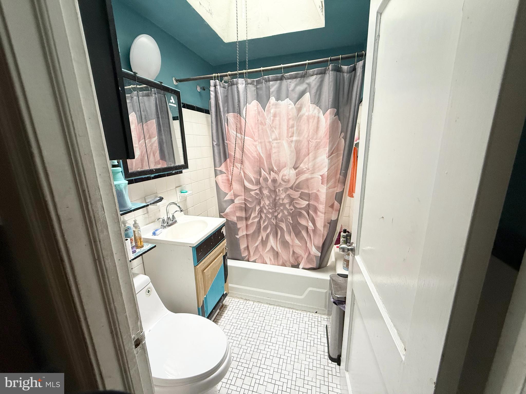 409 North Springfield Road Clifton Heights, PA 19018 - Photo 9 of 10 a bathroom with a sink toilet and shower