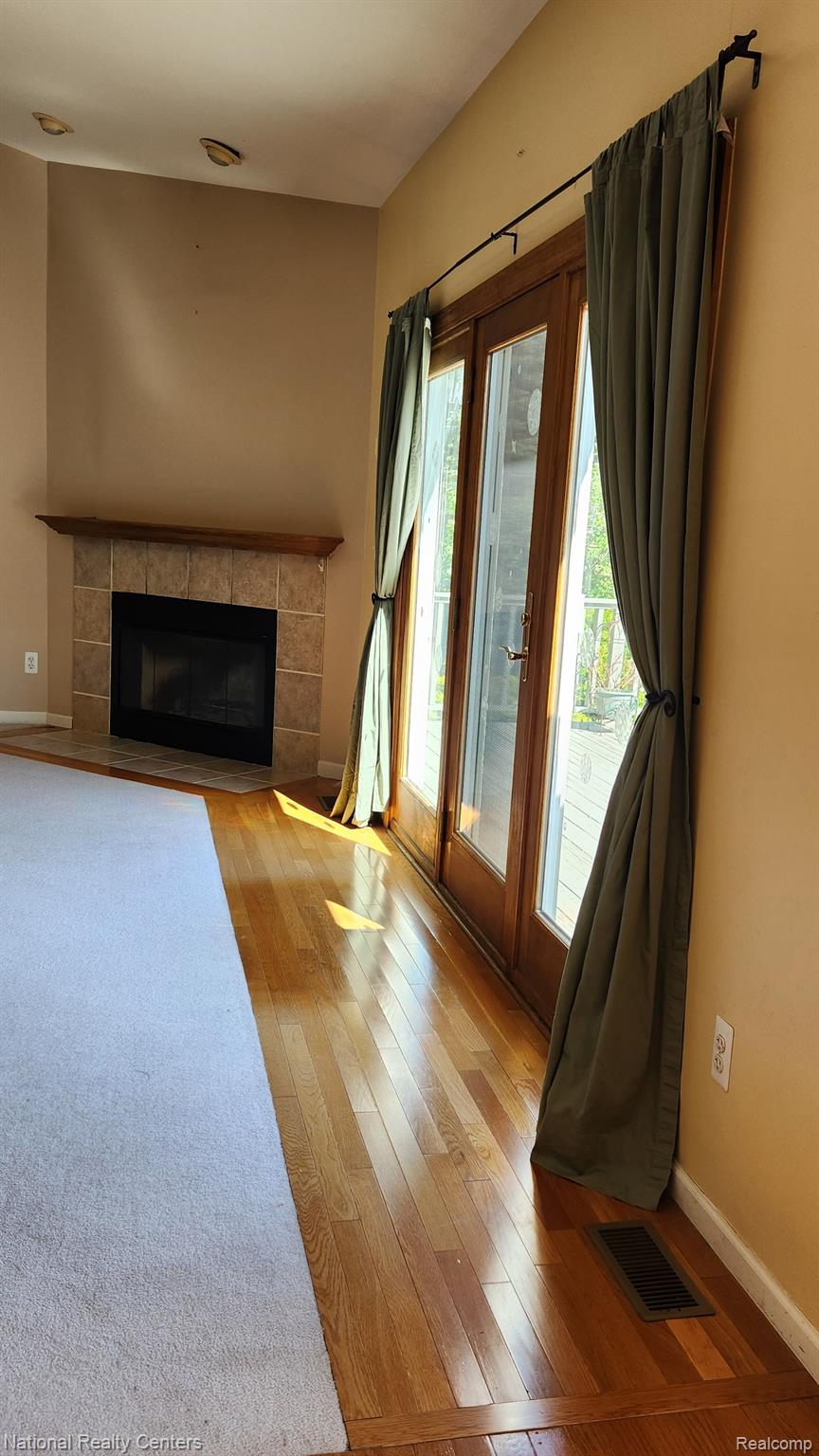 47745 Martz Road Belleville, MI 48111 - Photo 17 of 75 Wood flooring runs along wall