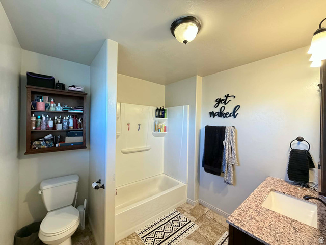 2095 West 4100 North Spring Glen, UT 84526 - Photo 14 of 35 Bathroom featuring vanity and shower combination