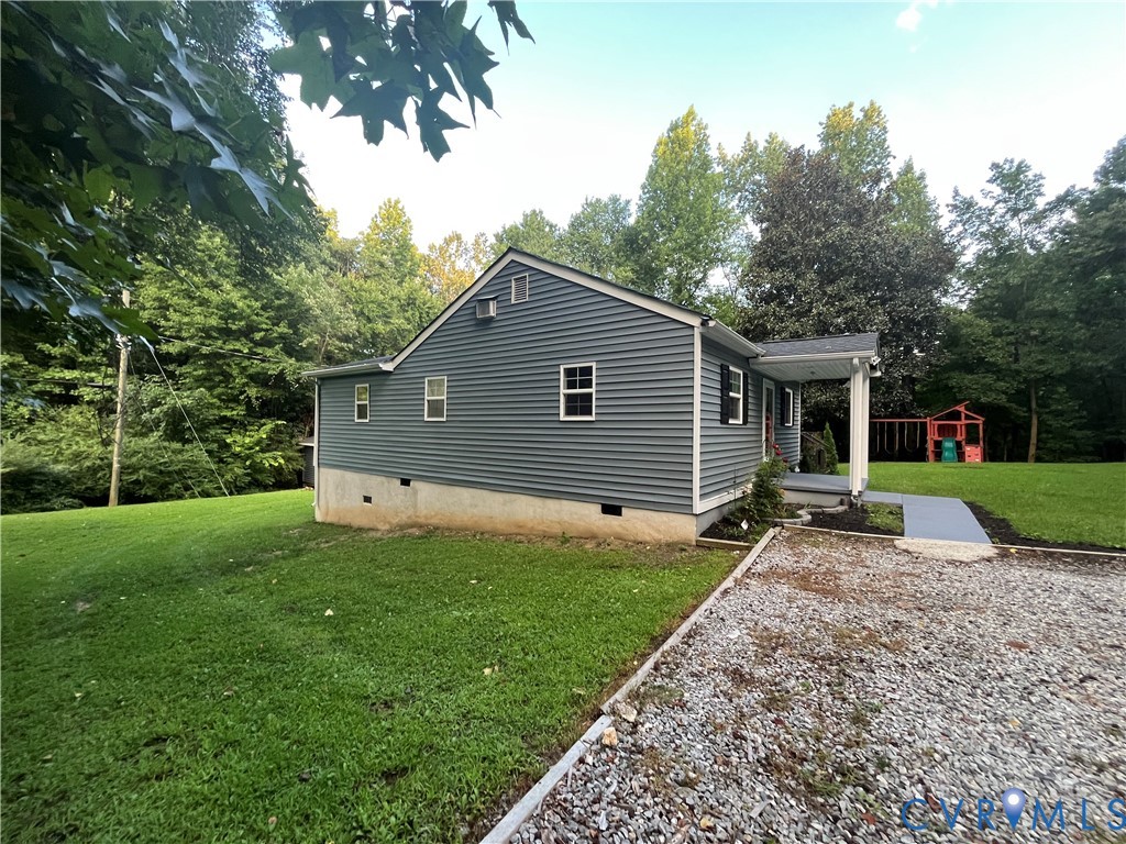 3074 Rocky Ford Road Crewe, VA 23930 - Photo 37 of 48 Gray siding exterior with white trim, covered fron