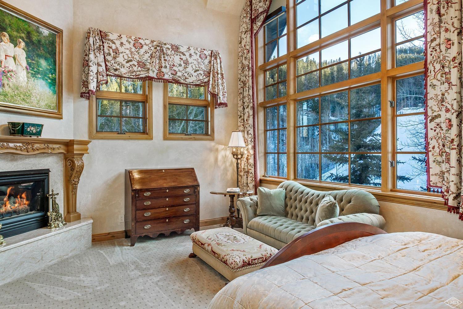 22 Strawberry Park Road Beaver Creek, CO 81620 - Photo 14 of 25 a living room with furniture and a fireplace