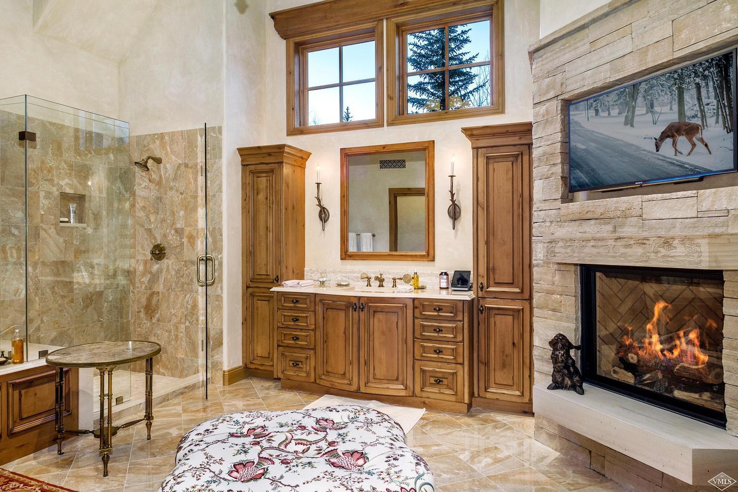 22 Strawberry Park Road Beaver Creek, CO 81620 - Photo 15 of 25 a living room with furniture and a fireplace