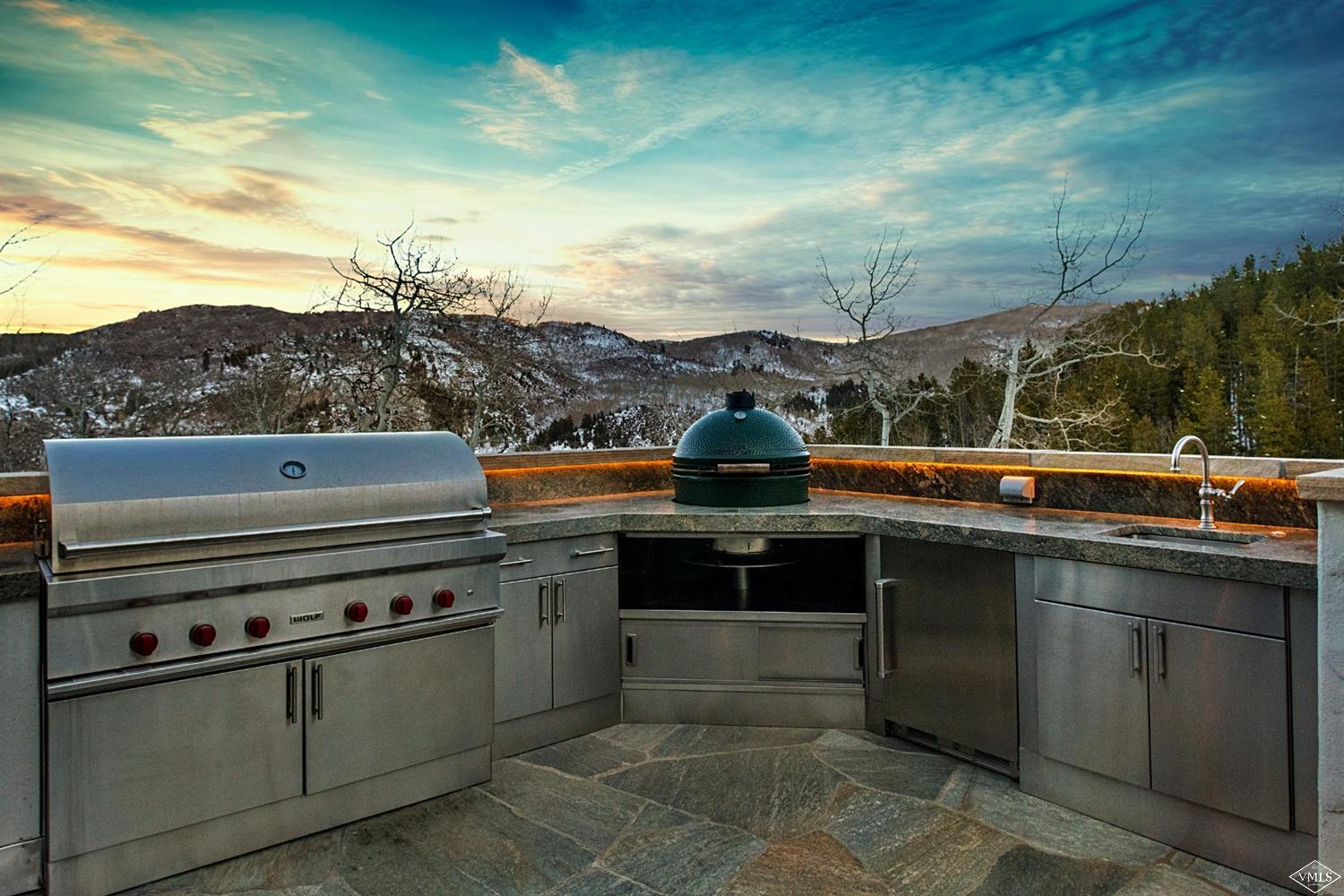 22 Strawberry Park Road Beaver Creek, CO 81620 - Photo 22 of 25 a view of a kitchen with a sink and dishwasher a stove
