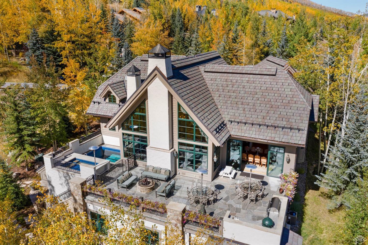 22 Strawberry Park Road Beaver Creek, CO 81620 - Photo 6 of 25 a view of house with yard and sitting area