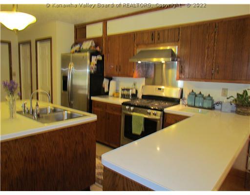 1114 Shamrock Road Charleston, WV 25314 - Photo 8 of 16 Kitchen. Eat in, newSS gas range, new hood, newer refrigerator, and dishwaster.