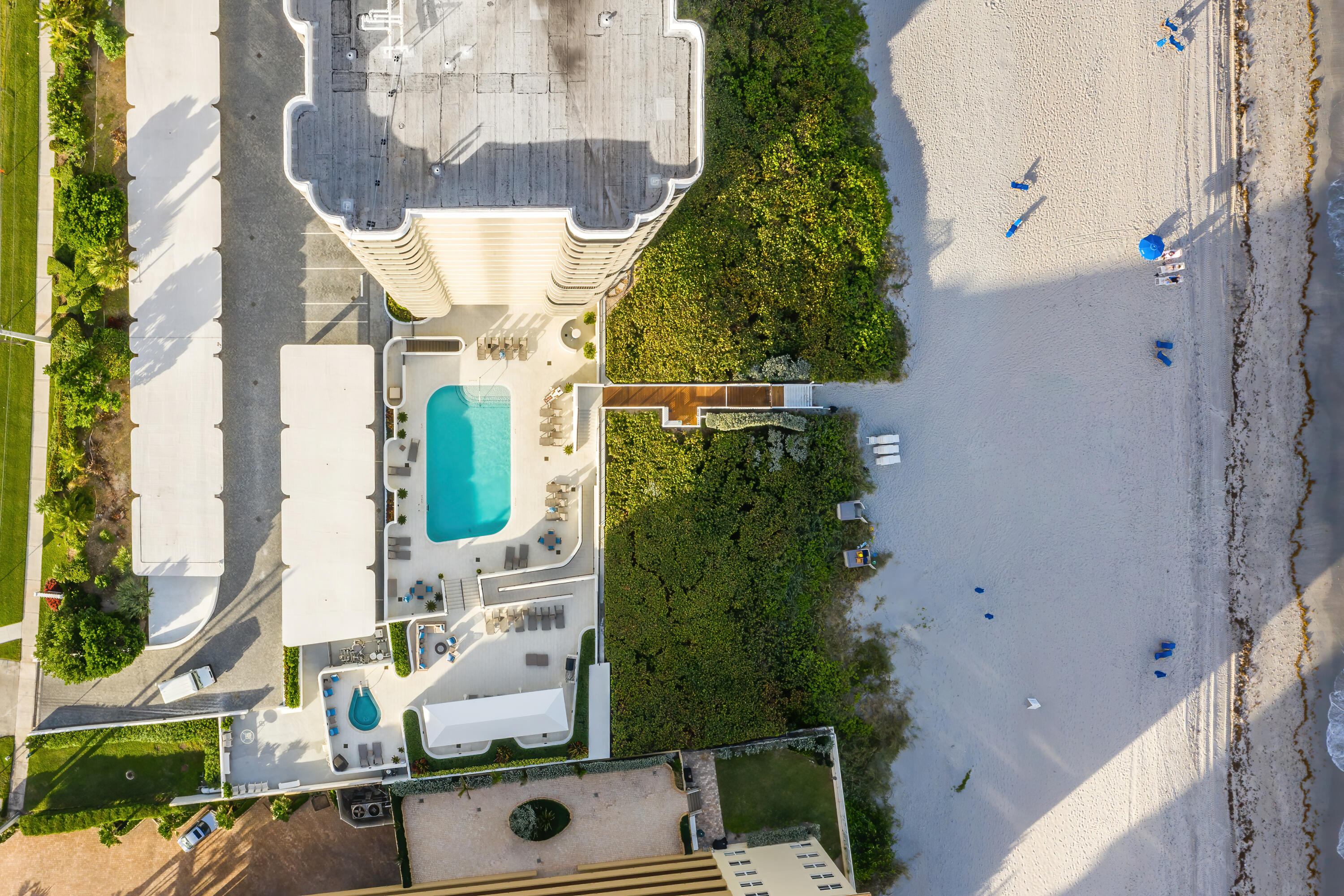 250 South Ocean Boulevard, Unit 14E Boca Raton, FL 33432 - Photo 25 of 27 aerial view of a house with a yard and potted plants