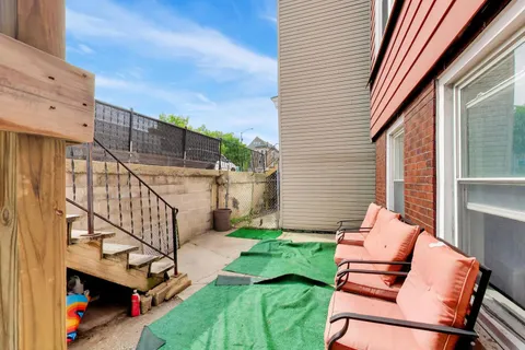 a view of yard with seating area