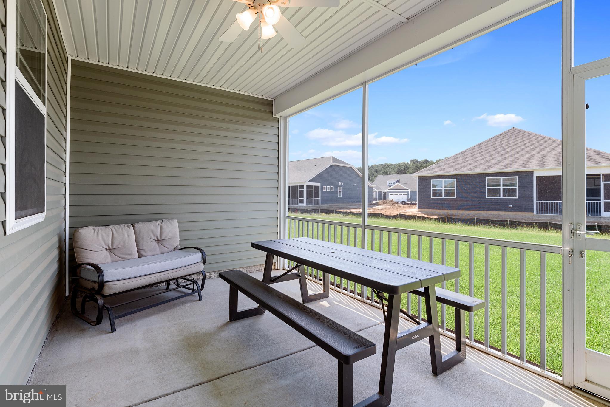 15352 Crape Myrtle Road Milton, DE 19968 - Photo 13 of 41 Screened porch overlooks manicured backyard
