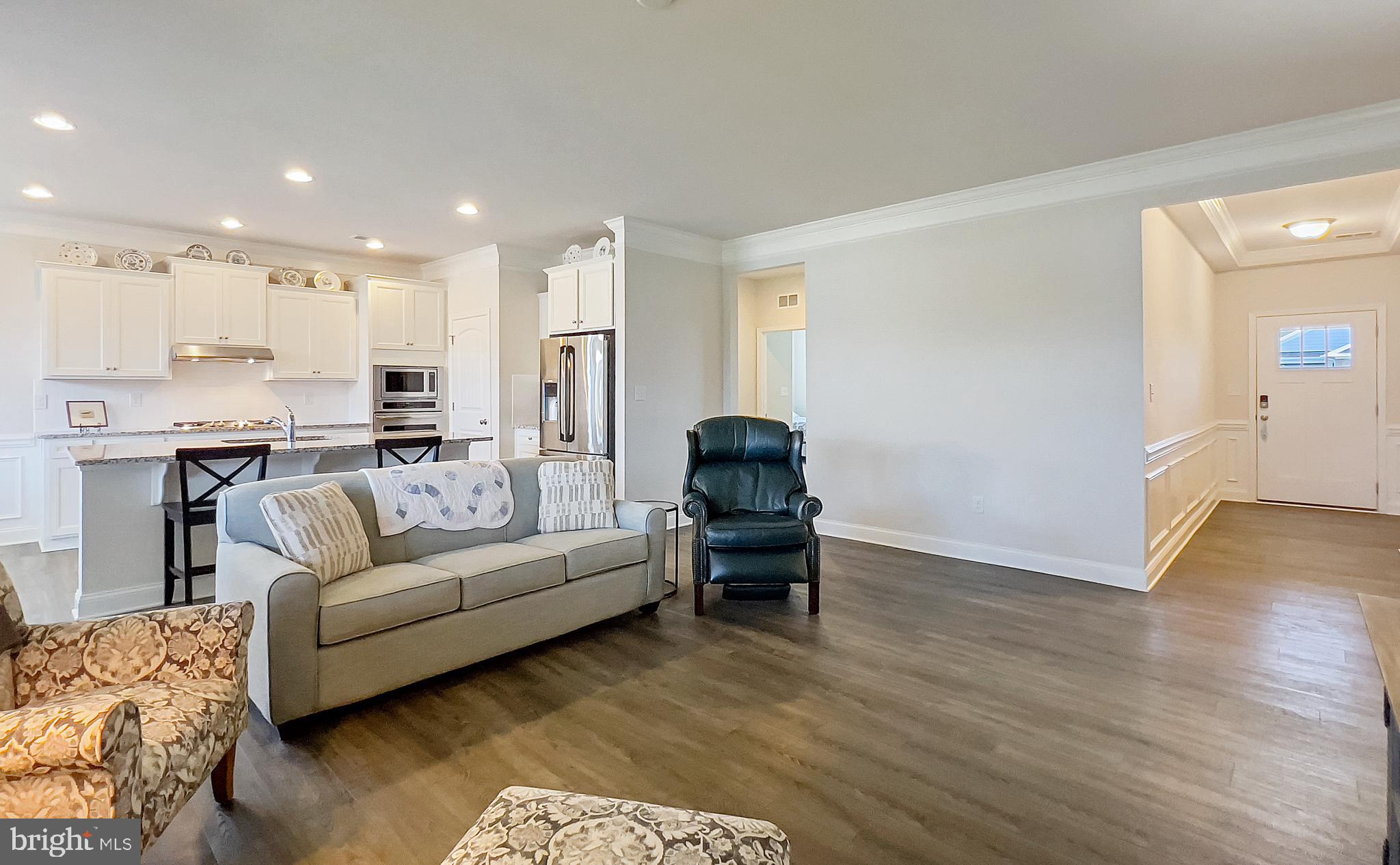15352 Crape Myrtle Road Milton, DE 19968 - Photo 16 of 41 Luxury vinyl flooring throughout main living area