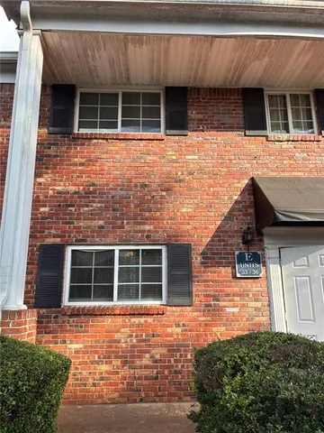 a front view of a house with windows