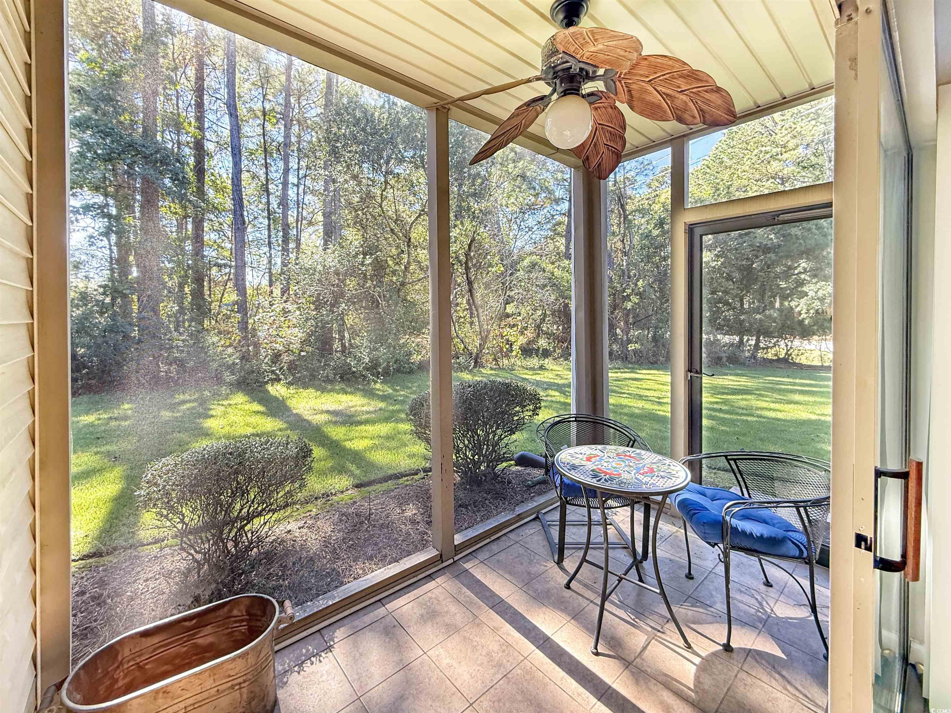 227 Pinehurst Lane, Unit 6D Pawleys Island, SC 29585 - Photo 37 of 39 Sunroom / solarium with a ceiling fan