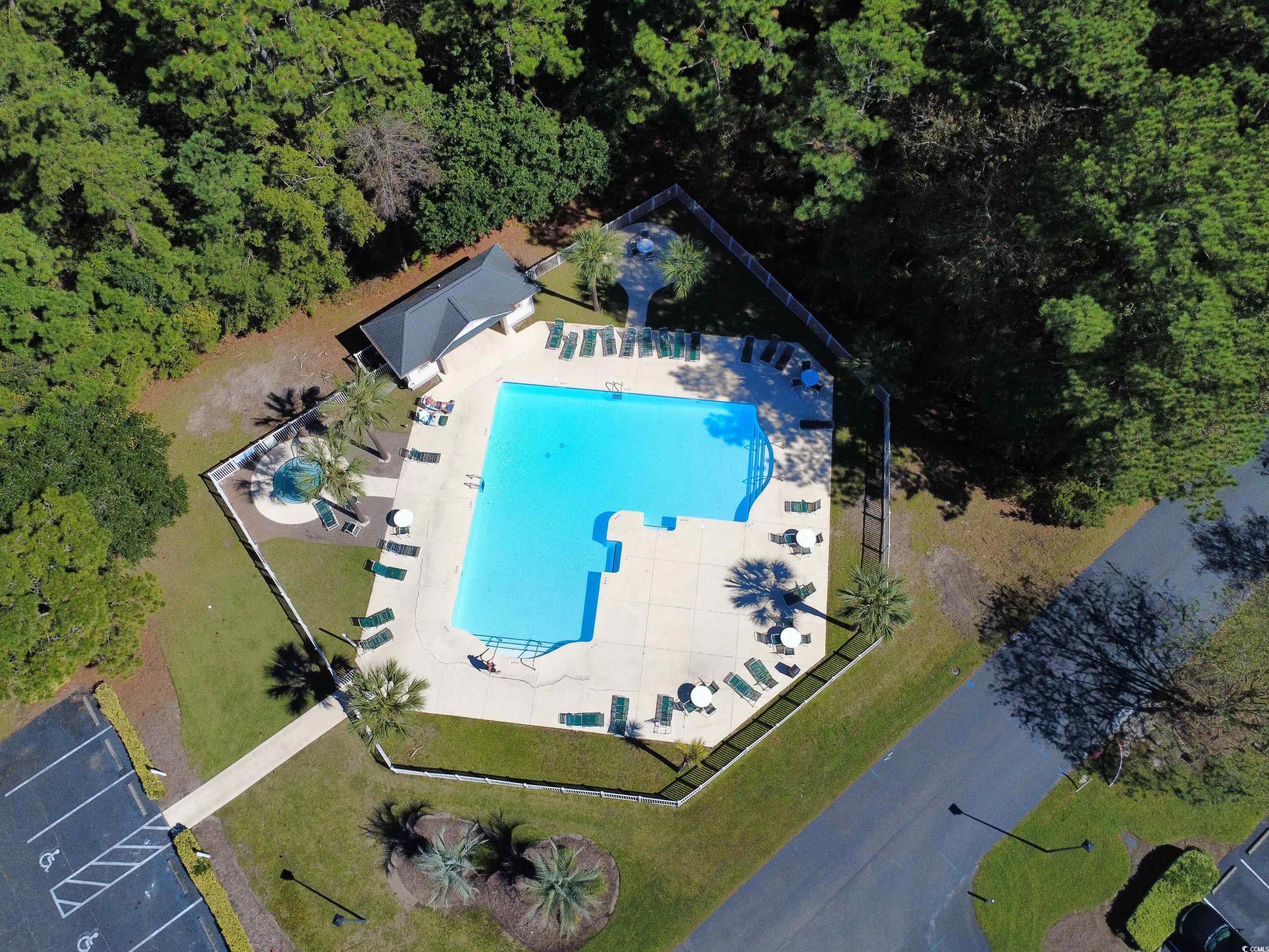 227 Pinehurst Lane, Unit 6D Pawleys Island, SC 29585 - Photo 8 of 39 Aerial view of a pool