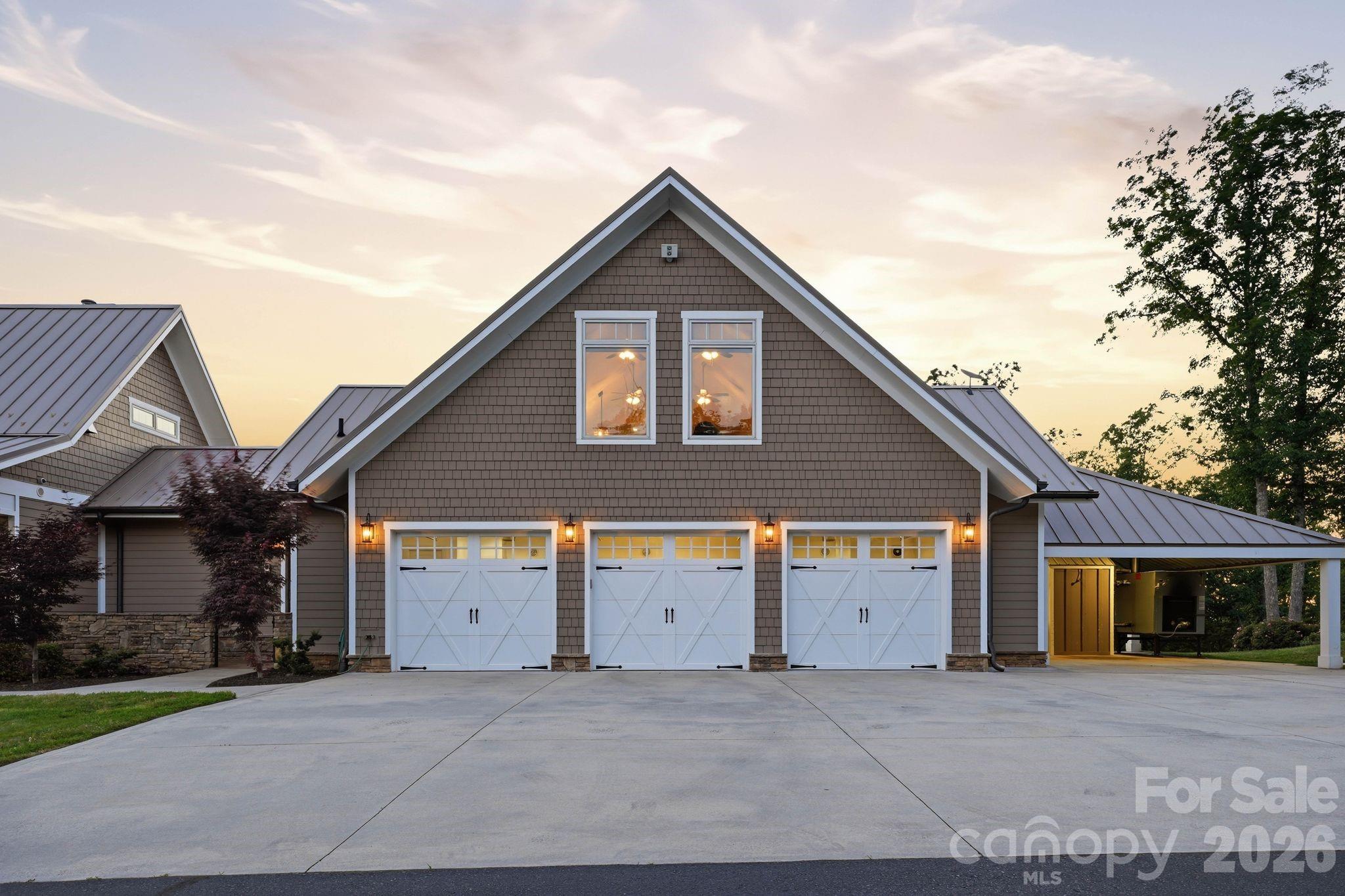 605 Recore Rdg Road Bessemer City, NC 28016 - Photo 27 of 47 a front view of a house with a yard and garage
