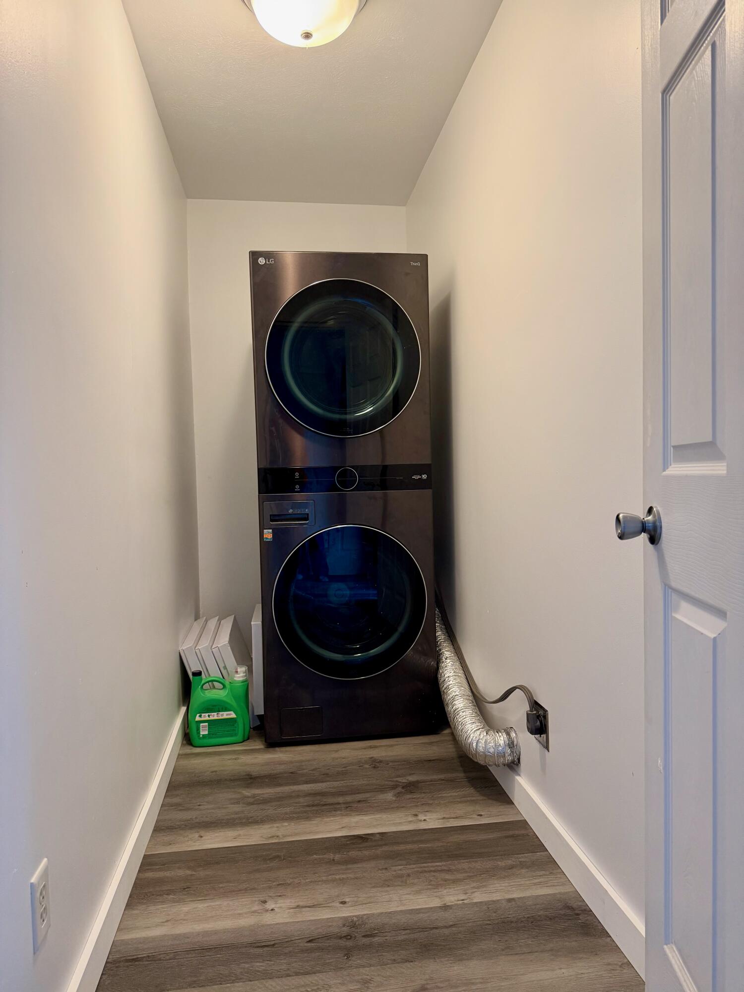 5850 West 600 North Winamac, IN 46996 - Photo 19 of 28 a view of a hallway with washer and dryer