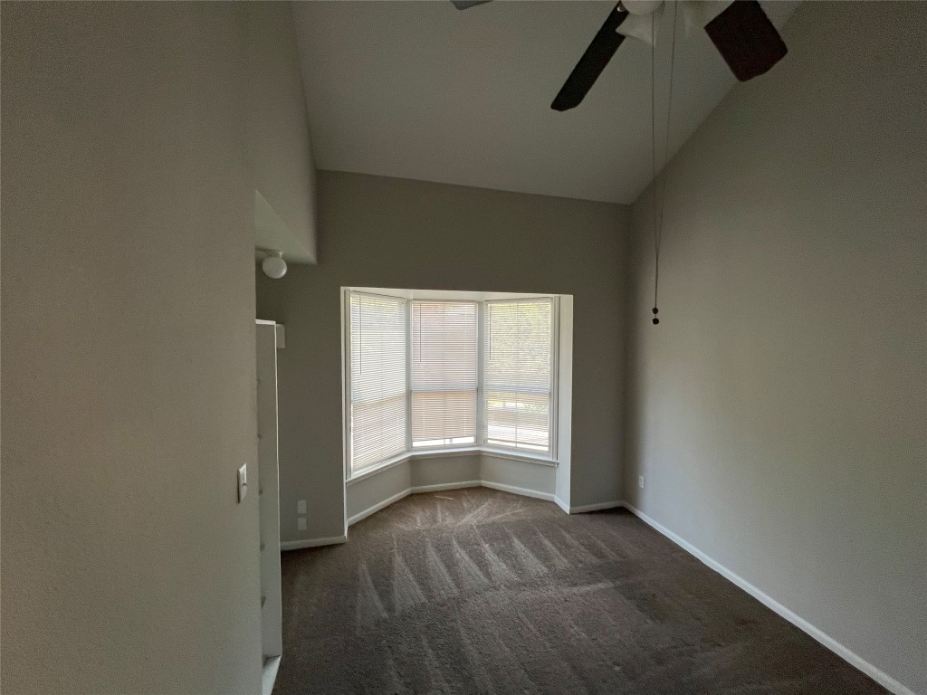 2529 Rio Grande Street, Unit 47 Austin, TX 78705 - Photo 5 of 11 an empty room with a empty space and windows