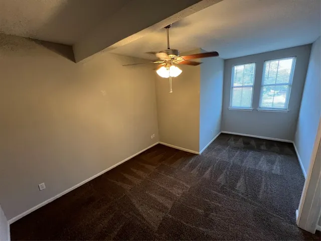 a front view of a building with glass windows